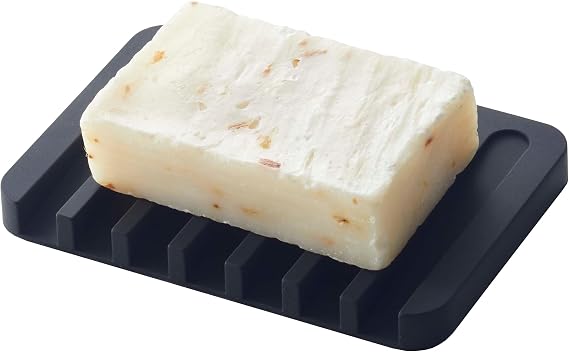 YAMAZAKI Home Flow Soap Tray - Silicone Holder Dish for Sink - Silicone | Sloped base directs water back into the sink to keep counters dry. Easy-to-clean design requires no assembly. Saves space.