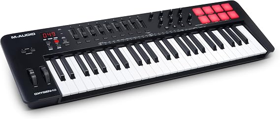 M-Audio USB MIDI Keyboard Controller 49 keys Velocity-sensitive pads, Native Instruments Sound Package included NKS integration Smart Chords Mode Scale Mode, Arpeggiator included  with a wealth